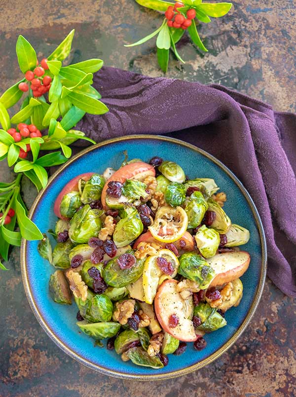 roasted brussel sprouts with fruit on a plate
