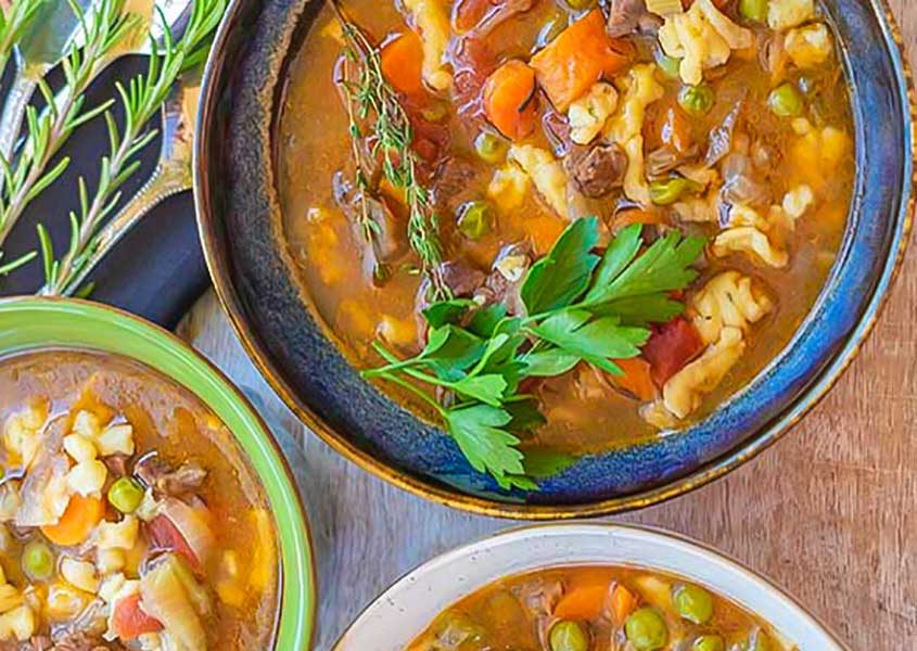 3 bowls of beef and vegetable soup