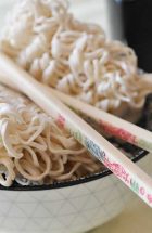ramen noodles in a bowl with chopsticks