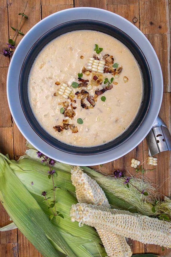 cream corn soup in a bowl with toppings