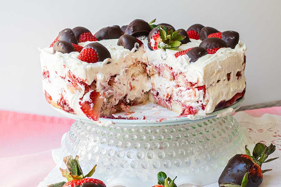 gluten free strawberry tiramisu cake on a platter