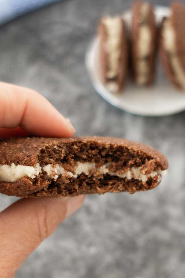 bite taken out of a cookie with cream