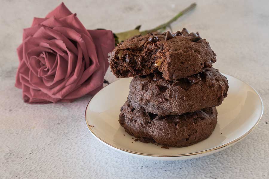 fudgy brownie cookies on a plate, gluten-free