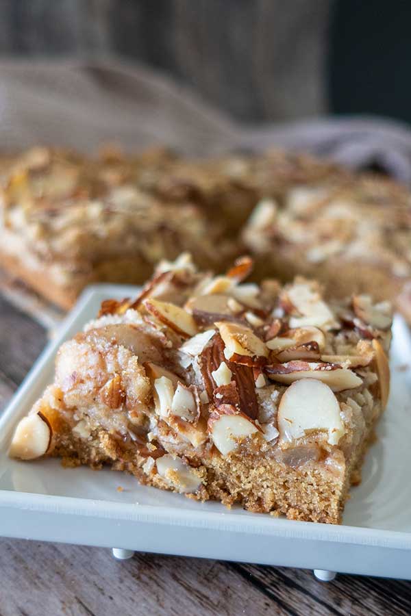 close up of a single slice baked gluten-free apple pie bar