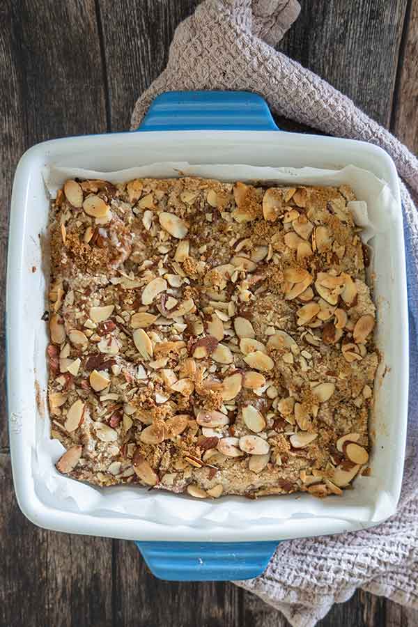 unsliced baked apple pie bars in a baking dish