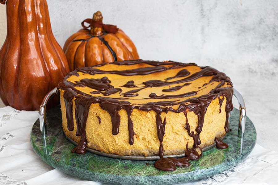 pumpkin mousse cake with chocolate sauce drizzle