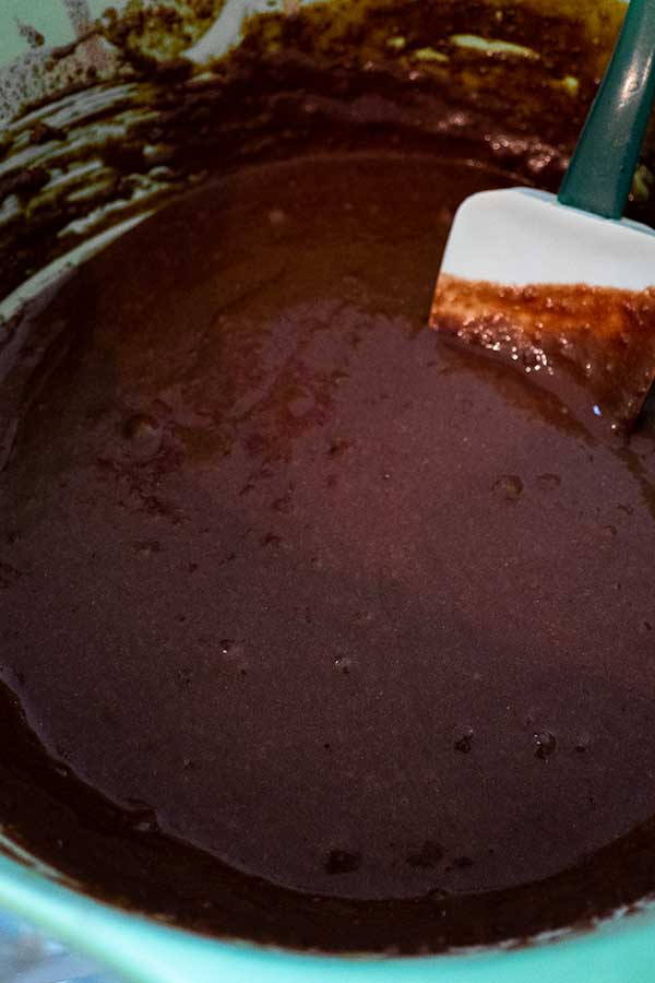 coffee brownie batter in a bowl with spatula