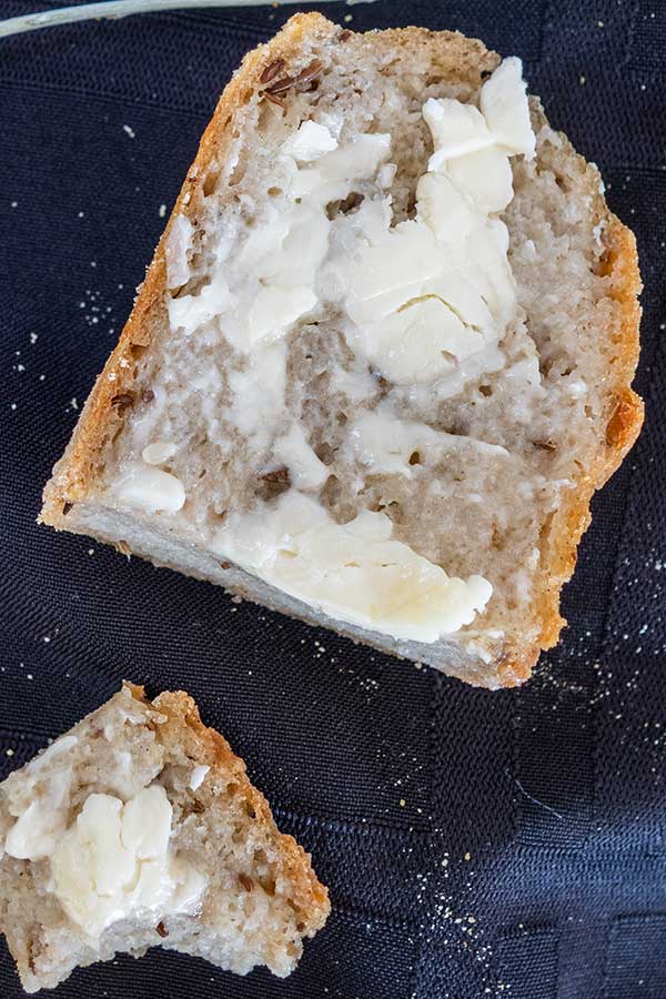 slice of caraway bread with butter