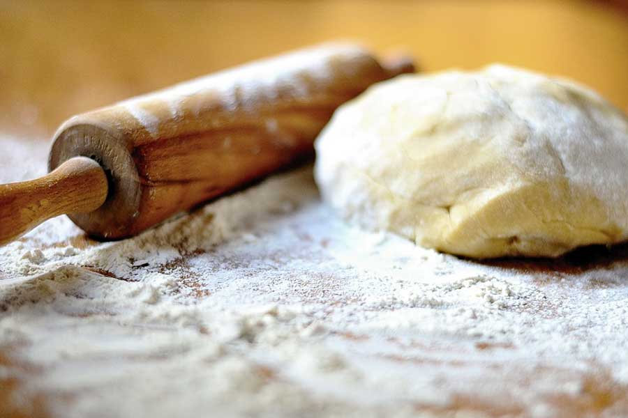 dough with gluten and rolling pin